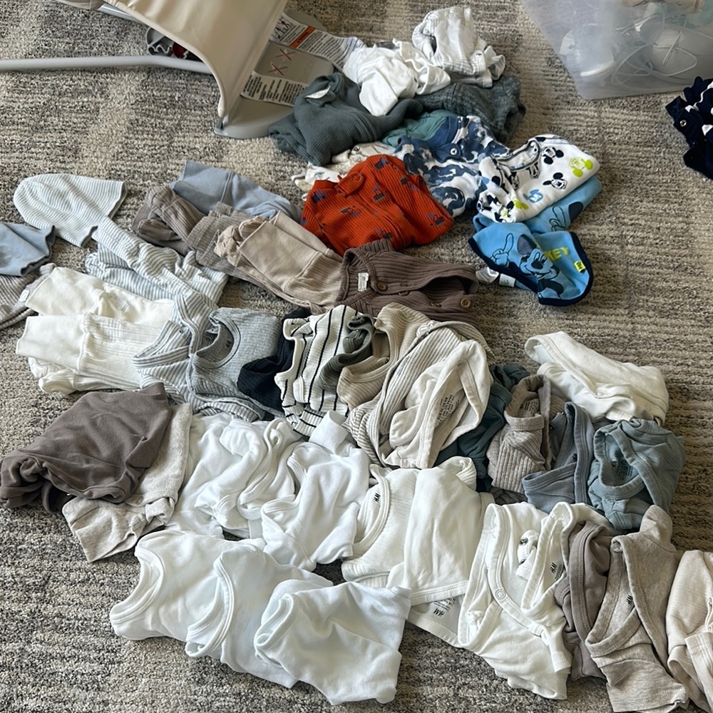 50 pcs approx- Mixed HM etc- Newborn clothes some never worn or 1x